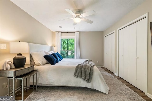 171 N Trce, Alpharetta, GA 30009 - bedroom with two closets, wood finished floors, and ceiling fan