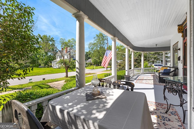 416 Engram St, Montezuma, GA 31063 - covered porch with outdoor dining space