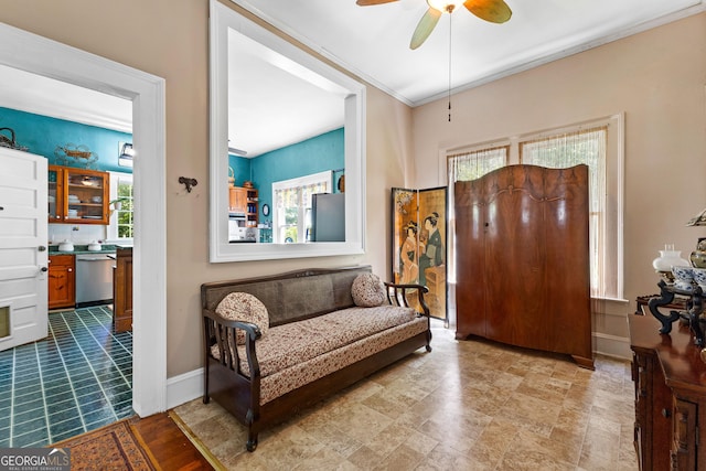 416 Engram St, Montezuma, GA 31063 - entrance foyer featuring a ceiling fan, crown molding, and baseboards