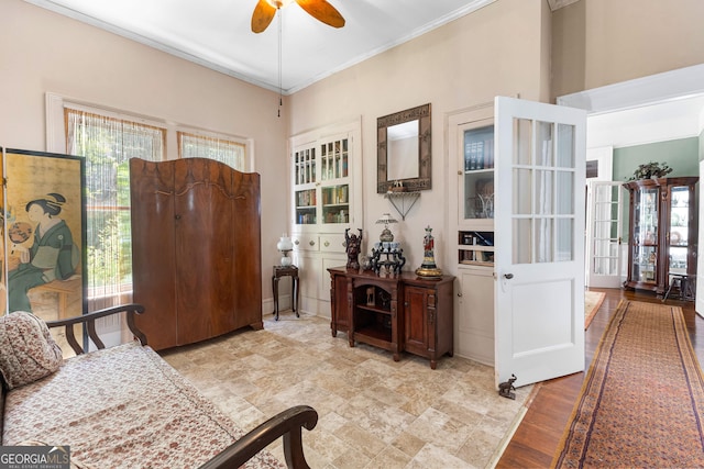 416 Engram St, Montezuma, GA 31063 - entrance foyer with a ceiling fan and crown molding