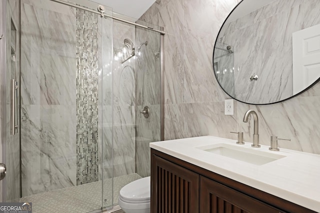 2499 Peachtree Rd Unit 506, Atlanta, GA 30305 - bathroom with a marble finish shower, tile walls, and vanity