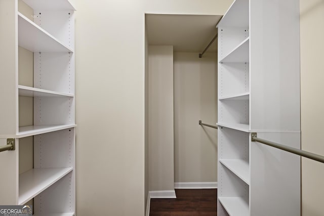 2499 Peachtree Rd Unit 506, Atlanta, GA 30305 - walk in closet with dark wood finished floors