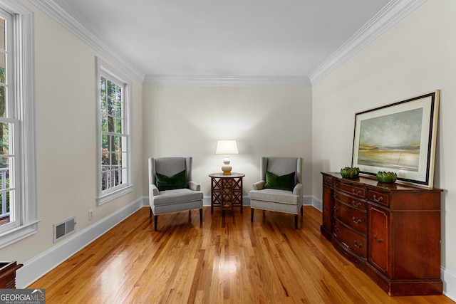 220 Broadmoor Dr, Fayetteville, GA 30215 - living area with light wood-type flooring, ornamental molding, and baseboards