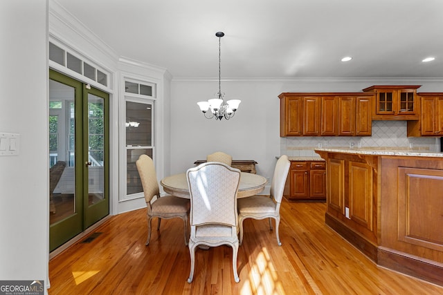 220 Broadmoor Dr, Fayetteville, GA 30215 - dining room featuring ornamental molding, light wood finished floors, a chandelier, and recessed lighting