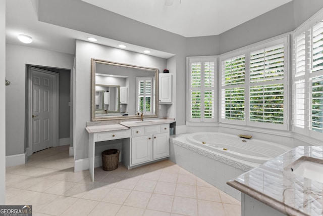 220 Broadmoor Dr, Fayetteville, GA 30215 - full bath with vanity, a jetted tub, tile patterned flooring, baseboards, and recessed lighting