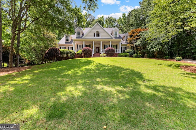 220 Broadmoor Dr, Fayetteville, GA 30215 - new england style home with covered porch and a front yard