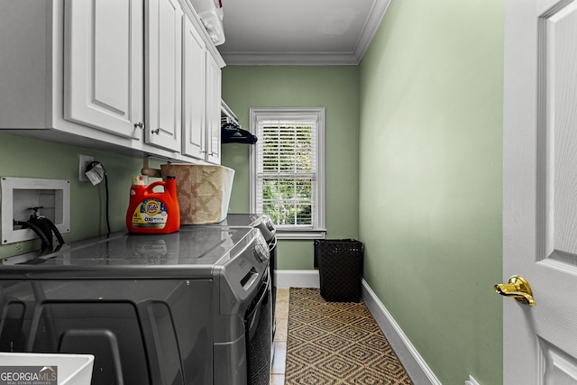 220 Broadmoor Dr, Fayetteville, GA 30215 - laundry room featuring washing machine and clothes dryer, cabinet space, crown molding, baseboards, and tile patterned floors