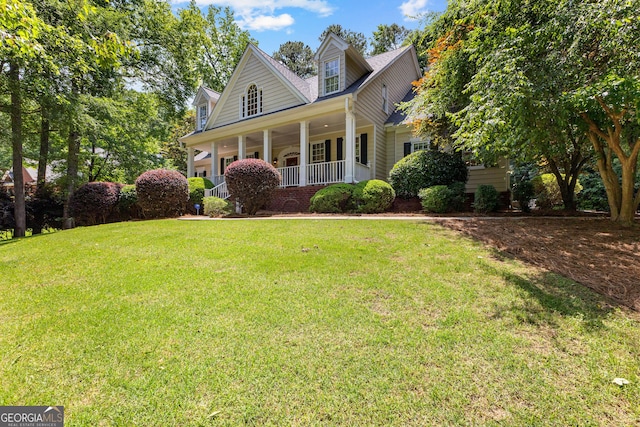 220 Broadmoor Dr, Fayetteville, GA 30215 - view of front of house featuring a porch and a front lawn