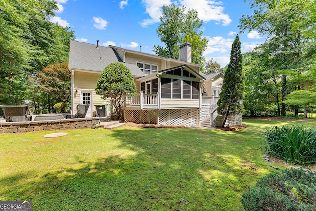 220 Broadmoor Dr, Fayetteville, GA 30215 - rear view of property featuring a sunroom, a chimney, stairs, a yard, and a deck