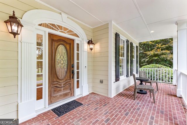 220 Broadmoor Dr, Fayetteville, GA 30215 - doorway to property featuring covered porch