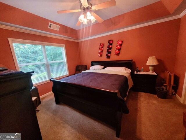 135 Pine Creek Way, Winterville, GA 30683 - carpeted bedroom with a tray ceiling, a ceiling fan, and ornamental molding