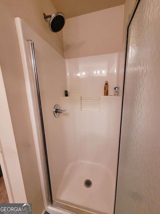 135 Pine Creek Way, Winterville, GA 30683 - full bathroom featuring a shower stall and tile patterned floors