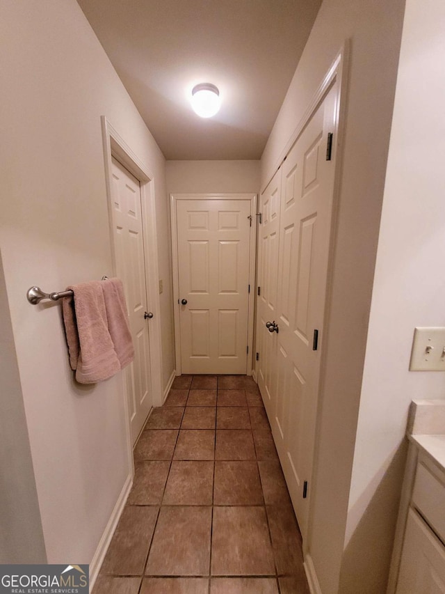 135 Pine Creek Way, Winterville, GA 30683 - hall with tile patterned floors and baseboards