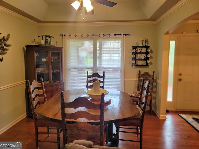 135 Pine Creek Way, Winterville, GA 30683 - dining room with arched walkways, dark wood-style flooring, a ceiling fan, lofted ceiling, and a raised ceiling