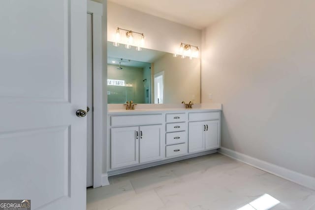37 Radian Way, Dallas, GA 30132 - bathroom featuring marble finish flooring, double vanity, a shower, and baseboards