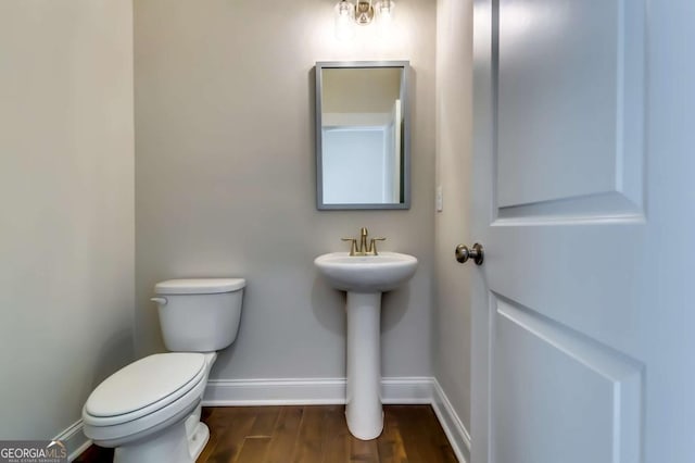 37 Radian Way, Dallas, GA 30132 - bathroom with toilet, baseboards, wood finished floors, and a sink