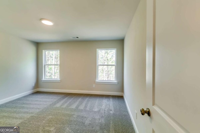 37 Radian Way, Dallas, GA 30132 - carpeted spare room with baseboards