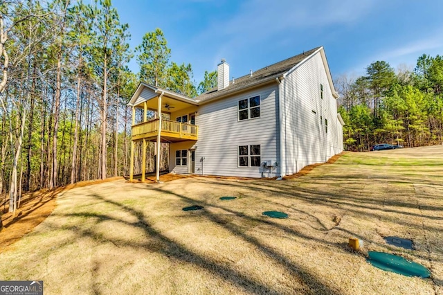 37 Radian Way, Dallas, GA 30132 - rear view of property featuring a ceiling fan, a balcony, a chimney, and a lawn