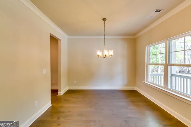 37 Radian Way, Dallas, GA 30132 - spare room with crown molding, a chandelier, dark wood-type flooring, and baseboards