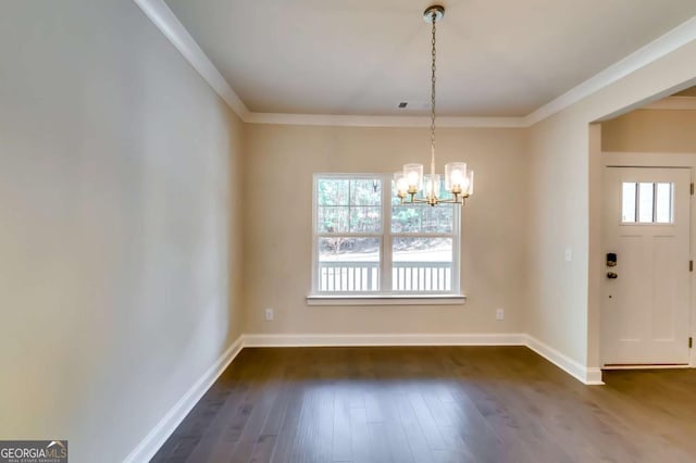 37 Radian Way, Dallas, GA 30132 - unfurnished dining area with a chandelier, dark wood finished floors, baseboards, and crown molding
