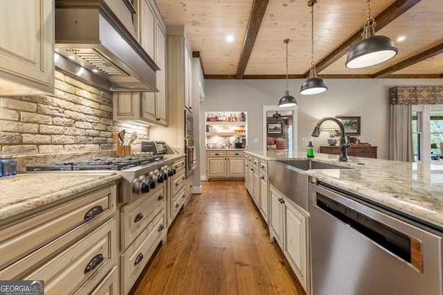 547 Toccoa River Ln, Mineral Bluff, GA 30559 - kitchen with custom range hood, stainless steel appliances, cream cabinetry, a sink, and light wood-type flooring