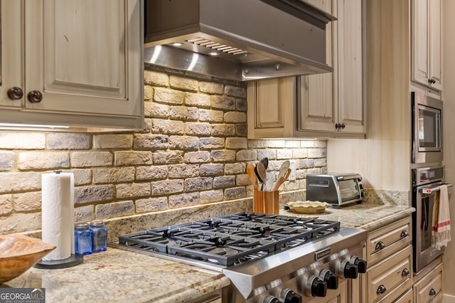 547 Toccoa River Ln, Mineral Bluff, GA 30559 - kitchen with custom exhaust hood, stainless steel appliances, decorative backsplash, and cream cabinets