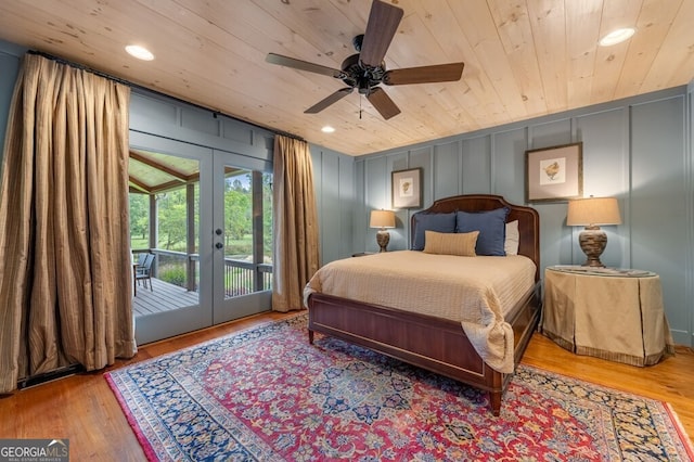 547 Toccoa River Ln, Mineral Bluff, GA 30559 - bedroom with french doors, wood ceiling, access to outside, a decorative wall, and wood finished floors