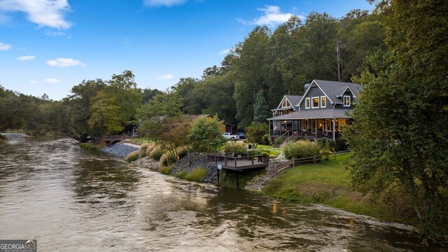 547 Toccoa River Ln, Mineral Bluff, GA 30559 - water view with a heavily wooded area and stairway