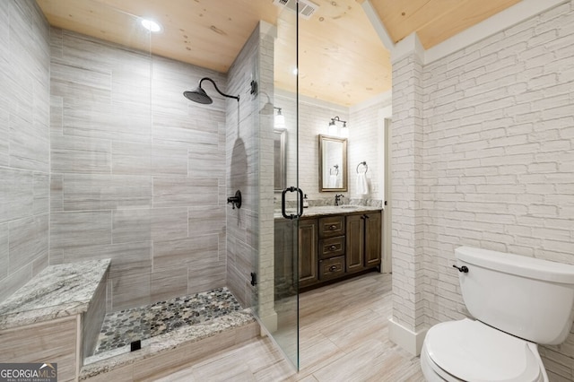 547 Toccoa River Ln, Mineral Bluff, GA 30559 - full bath featuring a stall shower, vanity, toilet, and tile patterned flooring