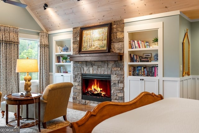 547 Toccoa River Ln, Mineral Bluff, GA 30559 - bedroom featuring a fireplace, wood finished floors, wood ceiling, and vaulted ceiling