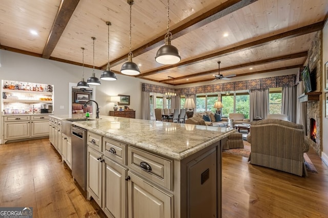 547 Toccoa River Ln, Mineral Bluff, GA 30559 - kitchen featuring light wood-type flooring, cream cabinets, wooden ceiling with exposed beams, open floor plan, and dishwasher