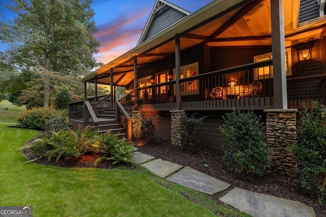 547 Toccoa River Ln, Mineral Bluff, GA 30559 - property exterior at dusk with a yard and stairs