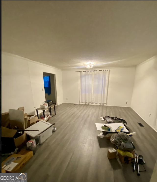 8020 Ga Highway 272, Sandersville, GA 31082 - unfurnished living room featuring wood finished floors