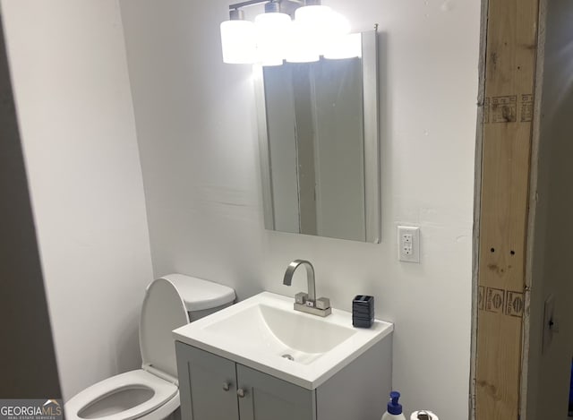 8020 Ga Highway 272, Sandersville, GA 31082 - half bath featuring vanity and toilet