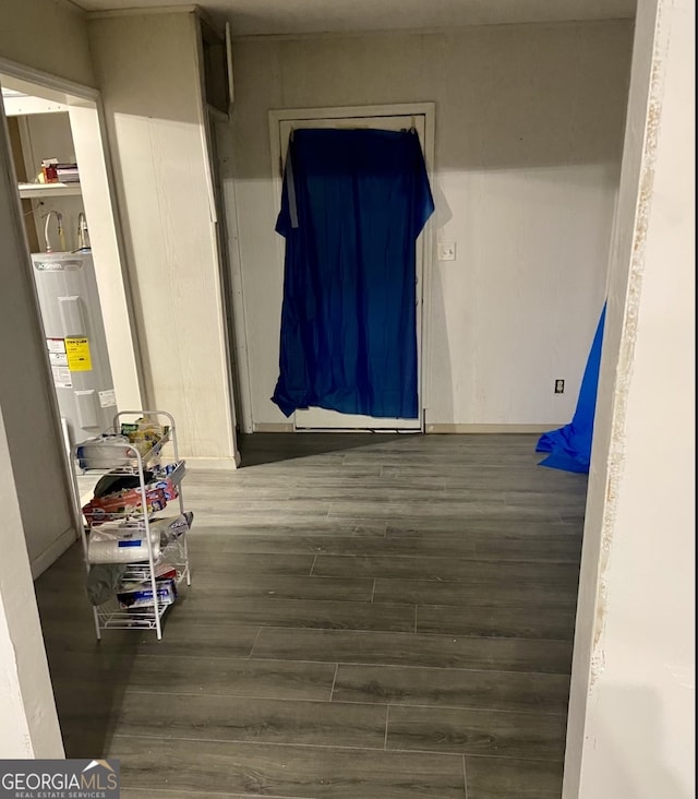 8020 Ga Highway 272, Sandersville, GA 31082 - corridor featuring wood finished floors and water heater