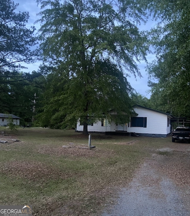 8020 Ga Highway 272, Sandersville, GA 31082 - view of home's exterior with driveway