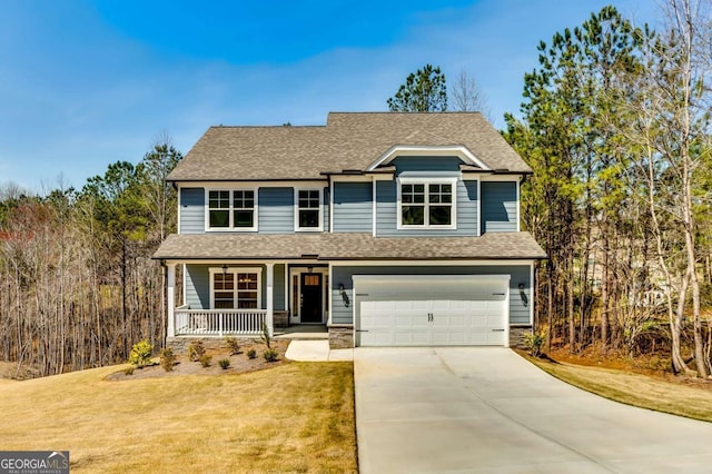 537 Principal Meridian Dr, Dallas, GA 30132 - view of front of property featuring covered porch, an attached garage, driveway, roof with shingles, and a front lawn