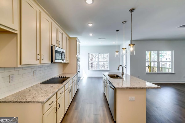 537 Principal Meridian Dr, Dallas, GA 30132 - kitchen with stainless steel appliances, a sink, dark wood-style flooring, healthy amount of natural light, and recessed lighting