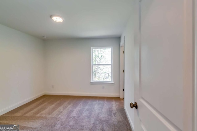 537 Principal Meridian Dr, Dallas, GA 30132 - carpeted empty room with baseboards