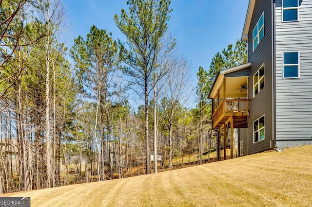 537 Principal Meridian Dr, Dallas, GA 30132 - view of grassy yard with a ceiling fan and a deck