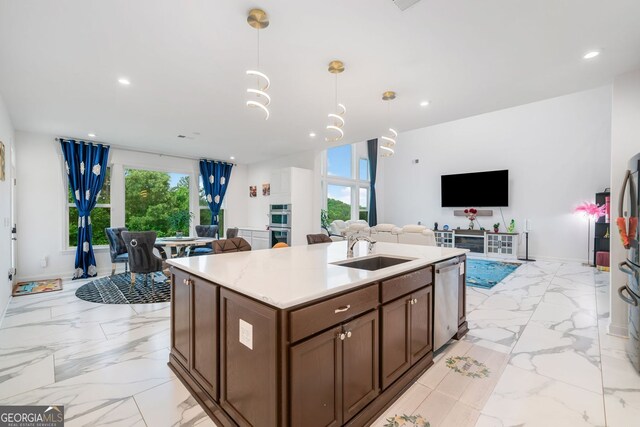 2121 Harmony Dr, Canton, GA 30115 - kitchen featuring open floor plan, appliances with stainless steel finishes, light marble finish flooring, and recessed lighting