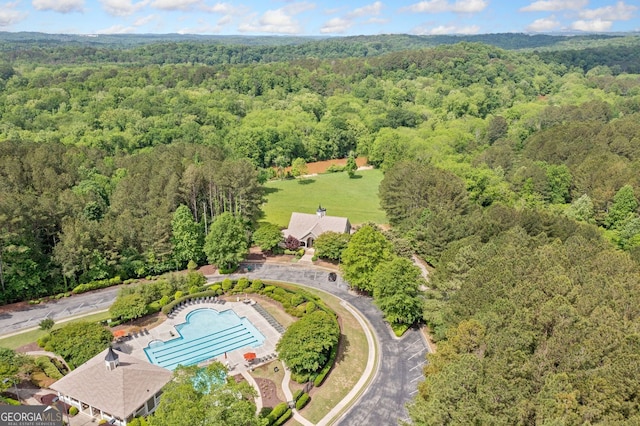 2121 Harmony Dr, Canton, GA 30115 - aerial view of property's location with a forest and a pool area