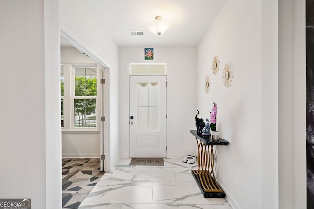 2121 Harmony Dr, Canton, GA 30115 - foyer with baseboards and marble look tile flooring