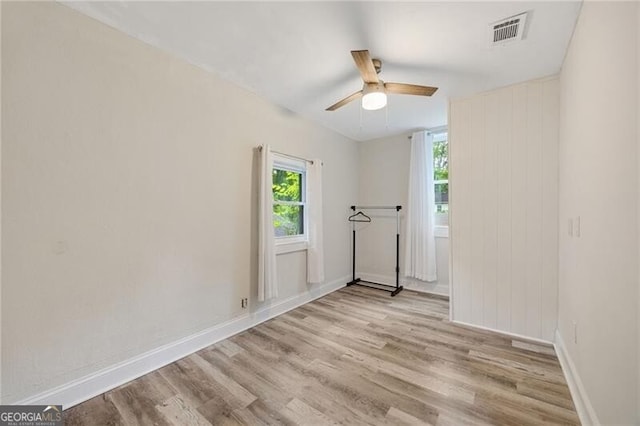 1268 Ladd St SW, Atlanta, GA 30310 - unfurnished room with wood finished floors, a ceiling fan, and baseboards