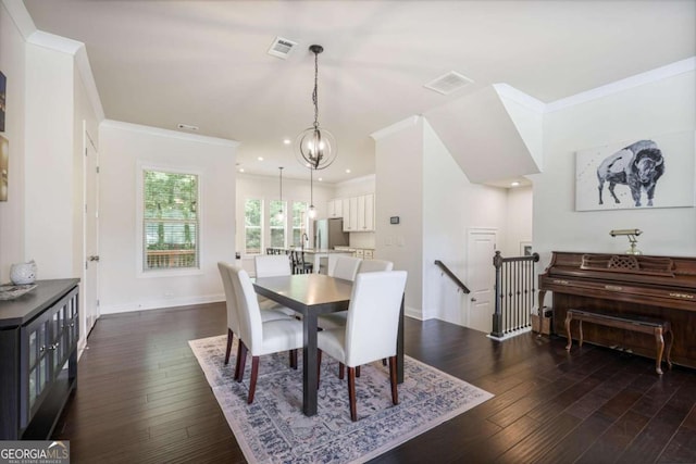 1188 Parktown Dr, Mableton, GA 30126 - dining room with ornamental molding, dark wood finished floors, baseboards, a chandelier, and recessed lighting