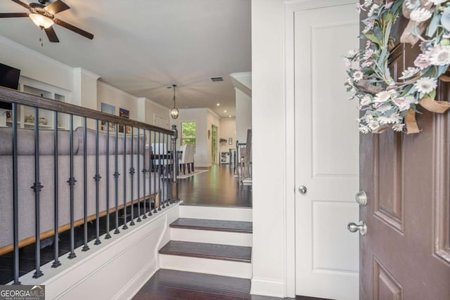 1188 Parktown Dr, Mableton, GA 30126 - stairway featuring wood finished floors, crown molding, and ceiling fan