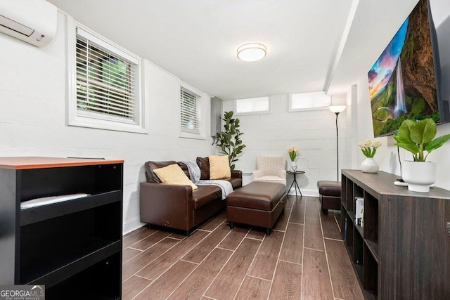 677 Holmes St NW, Atlanta, GA 30318 - sitting room featuring an AC wall unit and dark wood-style floors
