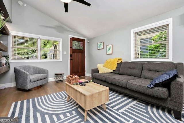 677 Holmes St NW, Atlanta, GA 30318 - living area with wood finished floors, a ceiling fan, and lofted ceiling
