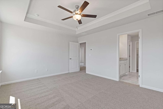 427 Buck Trl, Dallas, GA 30132 - unfurnished bedroom featuring a raised ceiling, light colored carpet, baseboards, connected bathroom, and ornamental molding