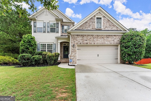 6160 Overleaf Ter, Cumming, GA 30040 - view of front of home with brick siding, driveway, and an attached garage